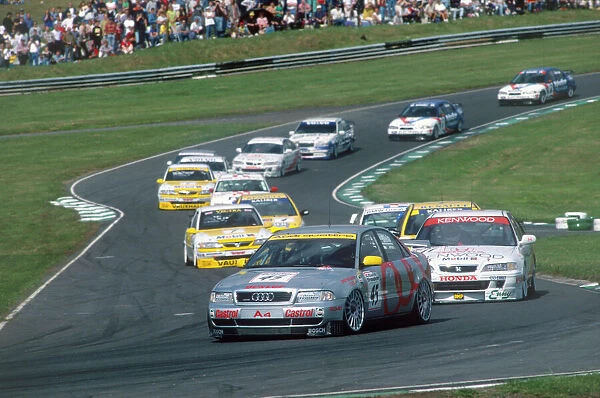 1996 British Touring Car Championship: Frank Biela, 1st position, leads the field at the start, action