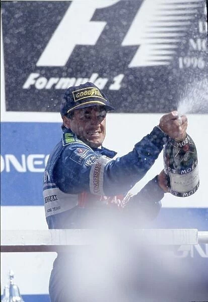 1996 Italian Grand Prix. Monza, Italy. 8 September 1996. Jean Alesi, Benetton B196-Renault, 2nd position, podium. World Copyright: LAT Photographic Ref: 35mm transparency