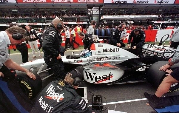 1997 AUSTRALIAN GP. Mika Hakkinen sits on the grid. Photo: LAT