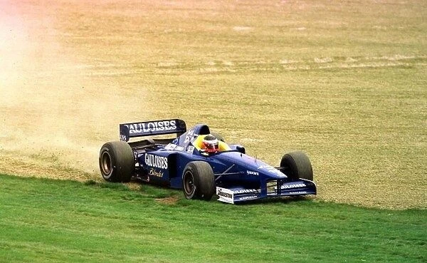 1997 AUSTRALIAN GP. Prosts Shinji Nakano spins off. Photo: LAT