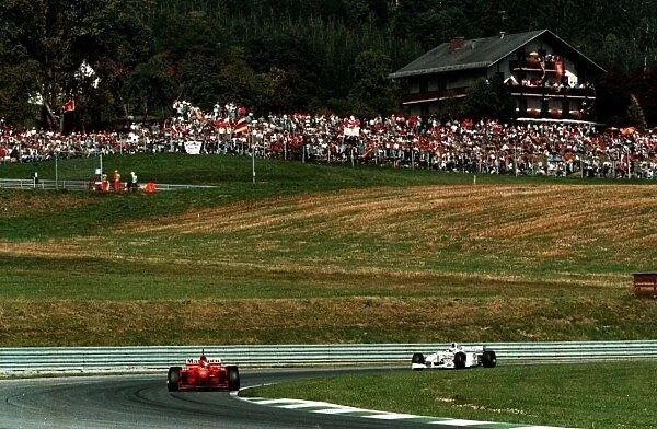 1997 AUSTRIAN GP. Michael Schumacher at the Osterreichring. Photo: LAT