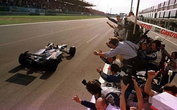 1997 LUXEMBOURG GP. Jacques Villeneuve wins at the Nurburgring. Photo: LAT
