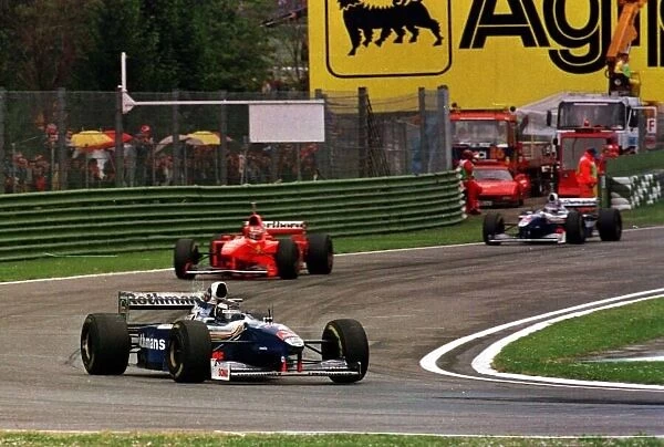 1997 SAN MARINO GP. Heinz-Harald Frentzen leads Michael Schumacher