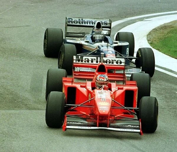 1997 SAN MARINO GP. Michael Schumcher leads fellow countryman Heinz-Harald Frentzen at