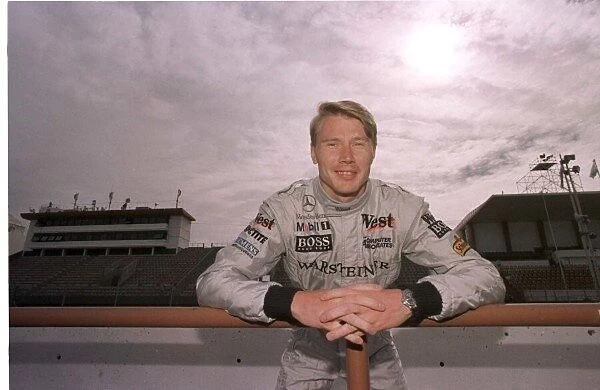 1998 ARGENTINIAN GP. Mika Hakkinen, McLaren Mercedes, relaxes at the circuit in Buenos