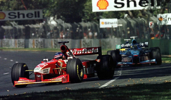 1998 AUSTRALIAN GP. Jacques Villeneuve, Williams, leads the Benetton of Giancarlo