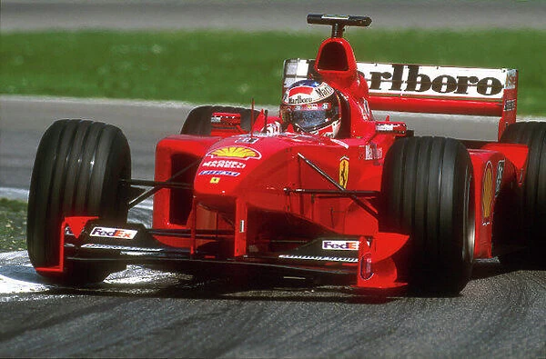 1999 San Marino Grand Prix Imola, Italy. 30th March - 2nd May 2001. Race winner Michael Schumacher, Ferrari F399, action. World Copyright: LAT Photographic ref: 35mm Image 99 SM 82
