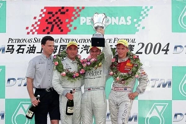 DTM. Podium and results:. 1st Gary Paffett (GBR), AMG Mercedes Benz, centre.