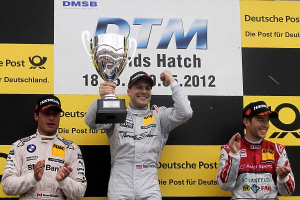 DTM. Podium and results:. 1st Gary Paffett (GBR) HWA, centre.