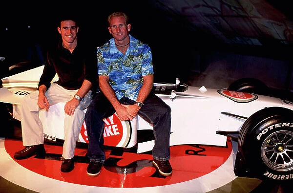 2000 Brazilian Grand Prix Interlagos, Brazil, 23rd - 26th March 2000. Ricardo Zonta and windsurfing World champion Robby Nash pose for pictures with the BAR Honda 002. World Tee / LAT email:digital@latphoto.co.uk