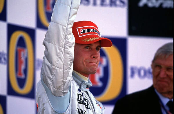 2000 British Grand Prix Silverstone, England. 21st - 23rd April 2000. Race winner David Coulthard salutes the crowd after winning his second British Grand Prix. Format: 35mm transparency World LAT Photographic Tel: +44 (0) 20 8251 3000 Fa