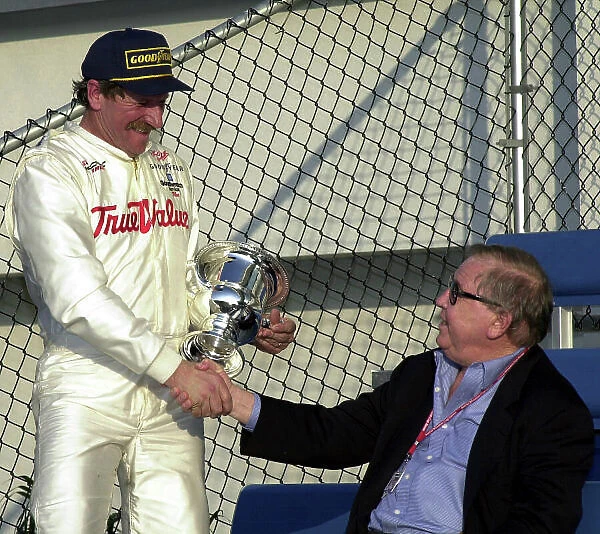 2000 Daytona 500, IROC Race, February 18, 2000, Daytona, FL, USA Bill France congratulates Dale Earnhardt on his IROC victory -podium / portrait. 2000, Michael L. Levitt, USA LAT PHOTOGRAPHIC