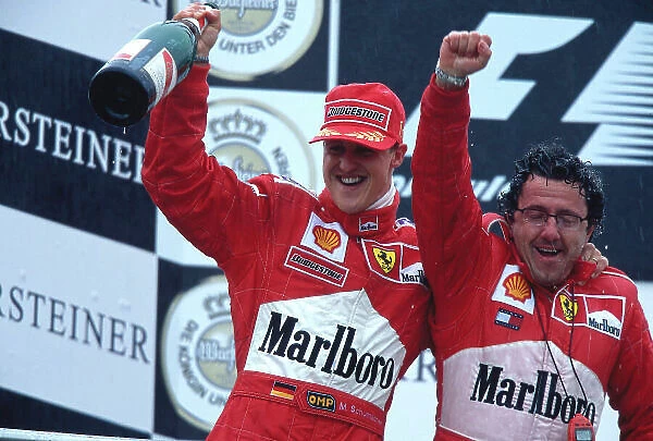 2000 European Grand Prix. Nurburgring, Germany. 19-21 May 2000. Michael Schumacher (Ferrari) celebrates his 1st position on the podium. Ref-2K EURO 66. World Copyright - LAT Photographic