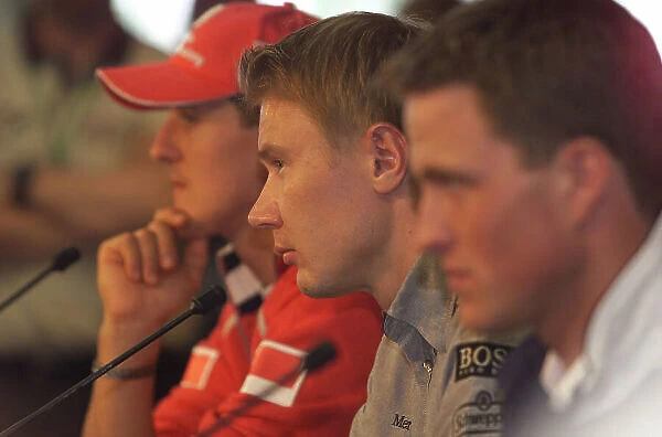 2000 European Grand Prix Nurburgring, Germany, 18th May 2000 Thursday Press Conference - Ralf and brother Michael with Mika Hakkinen. 18mb Digital World LAT Photographic Tel: +44 (0) 20 8251 3000 Fax: +44 (0) 20 8251 3001 e-mai