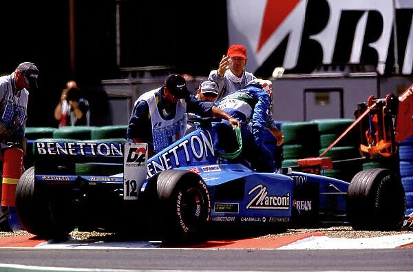 2000 French Grand Prix Magny Cours, France, June 30th - July 2nd Race. Alex Wurz steps away from his stricken Benetton. World Steven Tee  /  LAT Format: 35mm transparency Crash  /  acident