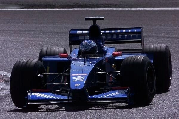 2000 French Grand Prix. QUALIFYING Magny Cours, France, 1 July 2000 JEAN ALESI, PROST PEUGEOT World LAT Photographic