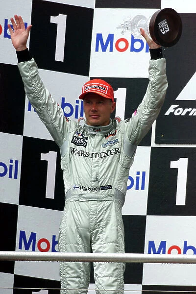 2000 German Grand Prix Hockenheim, Germany, 27th - 30th July 2000. Mika Hakkinen, McLaren Mercedes celebrates a second place finish. World Coates /  LAT Photographic ref: 5 mb Digital: Race