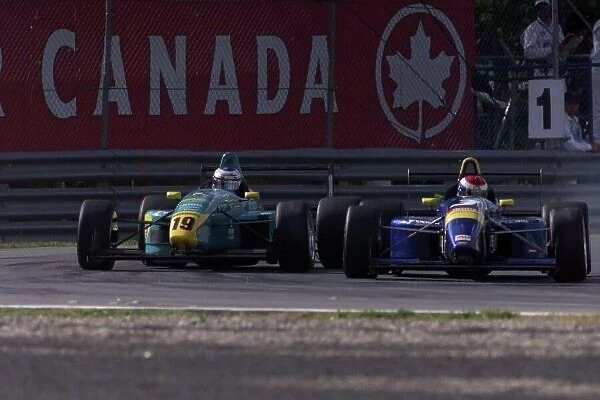 2000 Toyota Atlantic Championship Montreal, Canada, 17 June 2000 Dan Wheldon makes a great overtaking manouver. 3rd place World LAT Photographic
