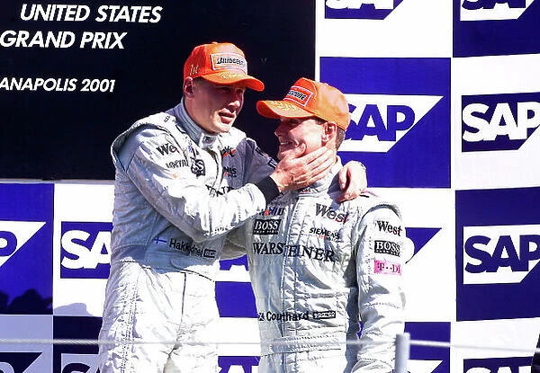 2001 American Grand Prix - Race Indianapolis, United States. 30th September 2001. Race winner Mika Hakkinen, West McLaren Mercedes MP4 / 16, and 3rd place finisher David Coulthard