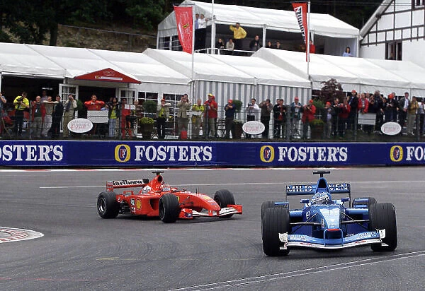 2001 Belgian Grand Prix - Race Spa Francorchamps, Belgium. 2nd Spetember 2001. Giancarlo Fisichella, Benetton Renault B201, leads Rubens Barrichello, Ferrari F2001