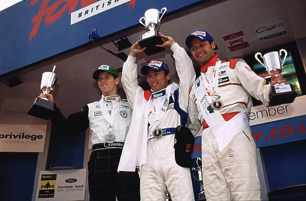 2001 British Formula 3 Championship Thruxton, England. 2nd September 2001. Takuma Sato (Carlin), winner of the Saturday race, with Anthony Davidson (Carlin) and Andy Priaulx (Alan Dorking Racing)