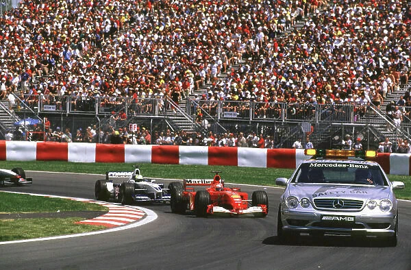 2001 Canadian Grand Prix Montreal, Canada. 8th-10th June 2001 The safety car heads Michael Schumacher, Ferrari F2001, and Ralf Schumacher, BMW Williams FW23
