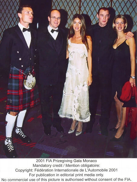 2001 FIA Prizegiving Gala Monaco David Coulthard and Richard Burns with girlfriends Mandatory credit  /  Mention obligatoire: Copyright Federation Internationale de L Automobile 2001. For publication in editorial print media only