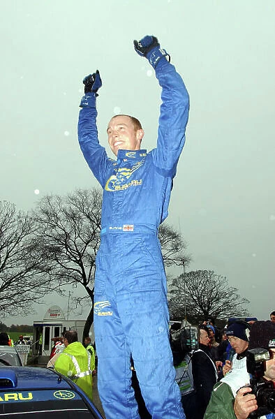 2001 FIA World Rally Championship. Rally of Great Britain. Cardiff, Wales. November 22-25, 2001. Richard Burns celebrates his World Championship victory at the end of the last stage - Margam. Photo: Ralph Hardwick / LAT