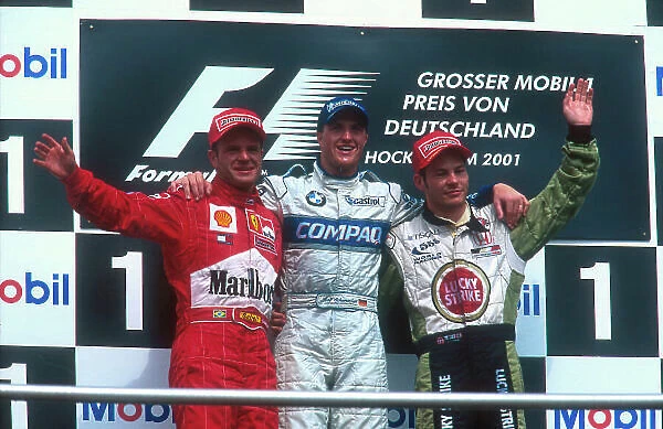 2001 German Grand Prix. Hockenheim, Germany. 27-29 July 2001. Ralf Schumacher (Williams BMW) 1st position, Rubens Barrichello (Ferrari) 2nd position and Jacques Villeneuve (B.A.R)