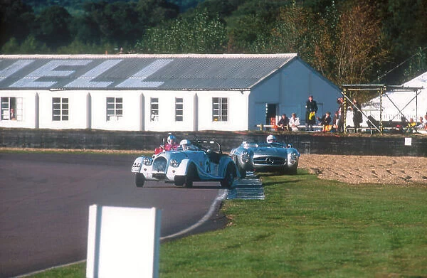2001 Goodwood Revival. Goodwood, Sussex, England. 15-16 September 2001. Douglas Blain (Morgan Plus 4) gets very sideways with Graham Scott (Mercedes-Benz 300SLS) and Charles Morgan (Morgan Plus 4) behind in the Fordwater Trophy race