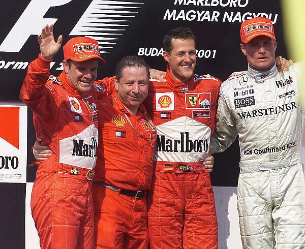 2001 Hungarian Grand Prix Hungaroring, Hungary. 19th August 2001. Race winner Michael Schumacher, Ferrari F2001, takes his 4th Formula 1 World Championship, the constructors tiltle for Ferrari and equals Alain Prosts 51 carrer wins
