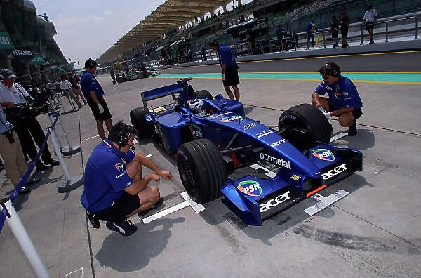 2001 Malaysian Grand Prix Sepang, Kuala Lumpur, Malaysia. 16th - 18th March 2001. Jean Alesi, Prost Acer , practices pitstops. Friday practice. World Copyright: Steve Etherington  /  LAT Photographic. ref: 18mb Digital Image