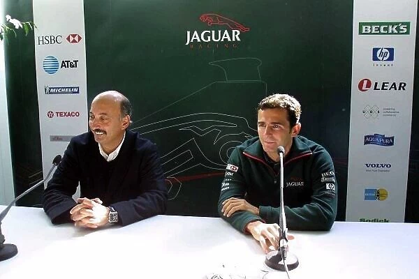 2001 Spanish Grand Prix Barcelona, Spain. 26th April 2001. Pedro de La Rosa is announced as Luciano Burti's replacement at Jaguar Racing. Here posing for the camera's with Bobby Rahal. World Copyright: Clive Rose / LAT Photographic