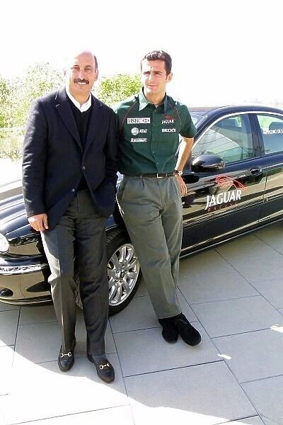 2001 Spanish Grand Prix Barcelona, Spain. 26th April 2001. Pedro de La Rosa is announced as Luciano Burti's replacement at Jaguar Racing. Here posing for the camera's with Bobby Rahal. World Copyright: Clive Rose / LAT Photographic ref