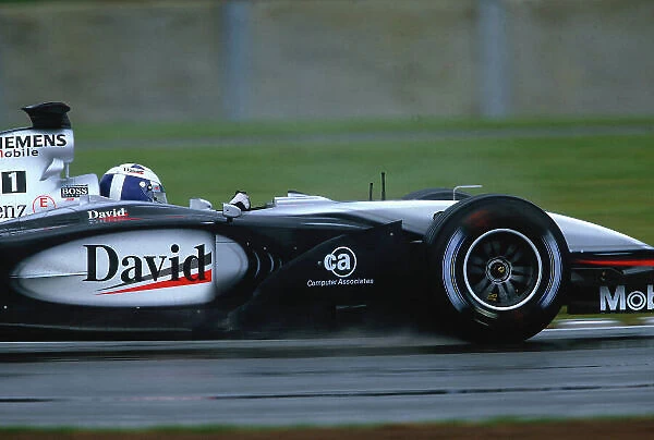 2002 British Grand Prix, Silverstone, England. 7th July 2002. David Coulthard had one of the worst races of his F1 carrer which saw him running in last position due to a catalogue of disasters for McLaren. World Copyright - LAT Photographic Ref