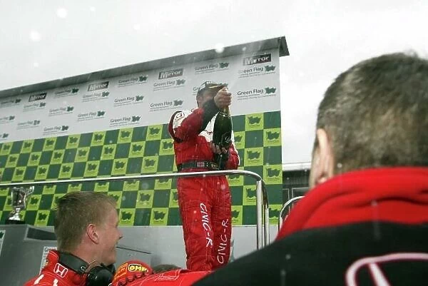 2002 British Touring Car Championship Brands Hatch, England. 25-26th August 2002. Alan Morrison showers members of his team with champagne. Photo: Paul Dowker / LAT Photographic World LAT PHOTOGRAPHIC 11.9MB Digital File Only