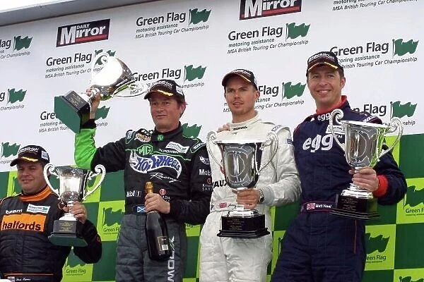 2002 British Touring Car Championship Thruxton, England. 5th-6th May 2002. Winner James Thompson with second place, Matt Neal and third place Anthony Reid with winning independant Tim Harvey Photo