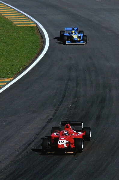 2002 FIA F3000 Championship Interlagos, Brazil. 29th - 30th March 2002. Tomas Enge (Arden Team Russia) leads Sebastien Bourdais (Super Nova Racing). Enge would retire while leading
