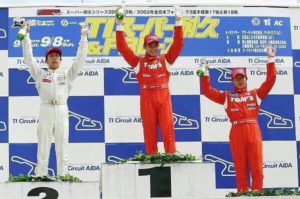 2002 Japanese Formula Three Championship Aida, Japan. 8th September 2002. Round 18, podium. World Copyright: Yasushi Ishihara / LAT Photographic ref: Digital Image Only