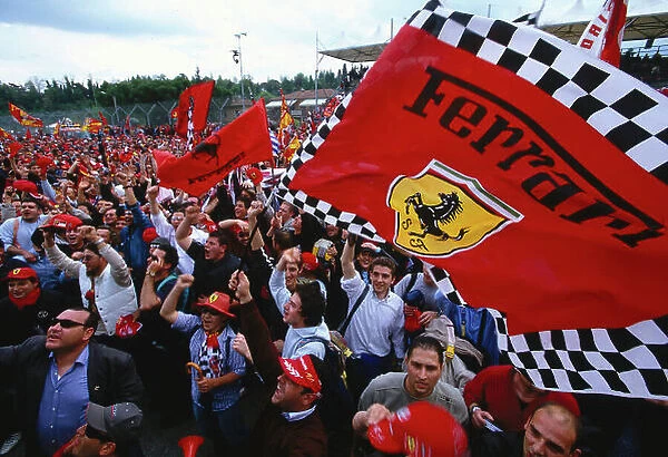 2002 San Marino Grand Prix. Imola, Italy. 12-14 April 2002. The Tifosi were out in force to see their beloved red cars take 1st and 2nd positions in the race. Ref-02 SM 21. World Copyright - LAT Photographic
