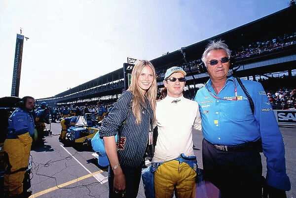 2002 United States Grand Prix Indianapolis, America. 27th - 29th eptember 2002. Jarno Trulli, Renault R202, with Flavio Briatore and German Supermodel XX