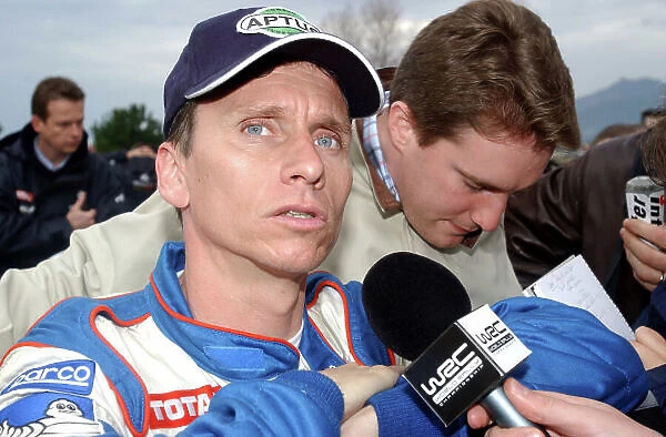 2002 World Rally Championship Inmarsat Corsica Rally, 8th-10th March 2002. Gilles Panizzi is interviewed at the end of the days leg. Photo: Ralph Hardwick / LAT