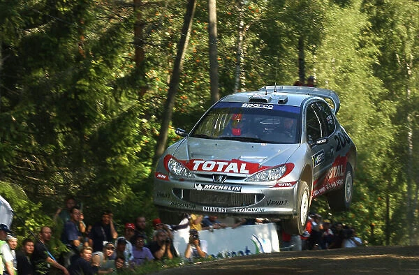 2002 World Rally Championship. Neste Rally Finland, Jyvaskyla Finland, August 8-11th. Richard Burns is about to land very badly on stage 12 Ouninpohja, lose more than 1 minute, and the lead of the rally