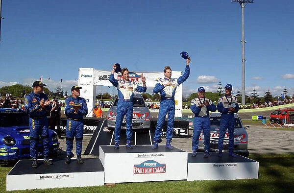 2002 World Rally Championship. Propecia Rally of New Zealand, Auckland, October 3rd-6th. The top three crews, all Finnish, on the Podium. Photo: Ralph Hardwick / LAT