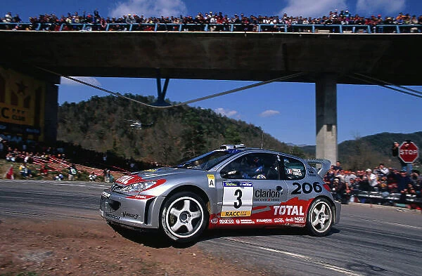 2002 World Rally Championship Rally Catalunya, Spain. 21st - 24th March 2002. Gilles Panizzi, Peugeot 206 WRC, 1st position overall. World Copyright: McKlein / LAT Photographic. ref: 35mm Image 02 WRC 14