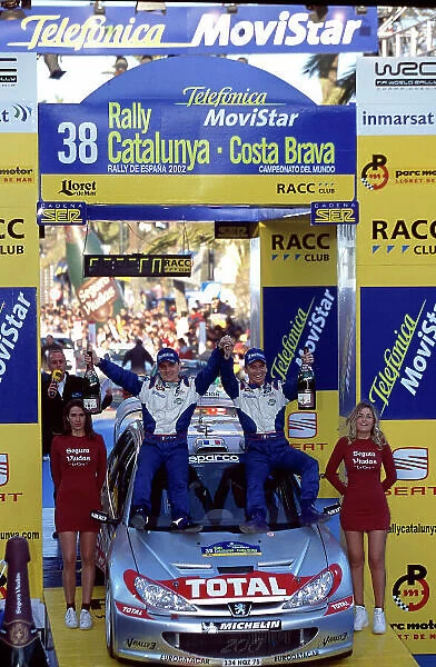 2002 World Rally Championship Rally Catalunya, Spain. 21st - 24th March 2002. Gilles Panizzi, Peugeot 206 WRC, 1st position overall. Podium. World Copyright: McKlein / LAT Photographic. ref: 35mm Image 02 WRC 19