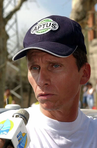 2002 World Rally Championship Rally Catalunya, 21st-24th March 2002. Gilles Panizzi gives a radio interview after only one of the second day's first 3 stages was run at competitive speeds, due to spectator problems. Photo: Ralph Hardwick / LAT
