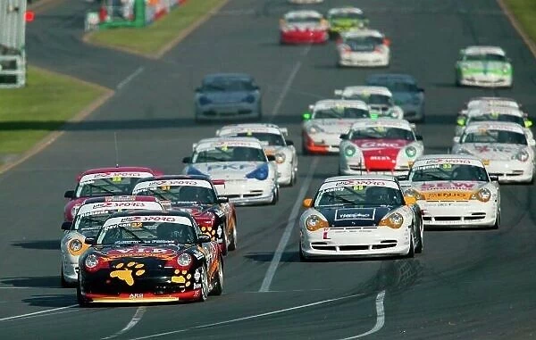 2003 Australian Porsche Cup Car Grand Prix, Victoria,Australia 9th March 2003 Guest Porsche Cup Car driver Alex Davidson leads the field into turn 1 during the Cup Car race 1 at the 2003 Australian GP. World Copyright