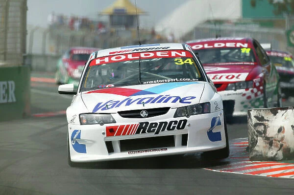 2003 Australian V8 Supercars Surfers Paradise, Australia. October 25th 2003. Garth Tander leads Steven Richards during the Gillette V8 Supercar event at the Lexmark Indy 300 at the Sufer's Paradise street circuit. World Copyright