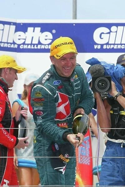 2003 Australian V8 Supercars Surfers Paradise, Australia. October 25th 2003. Ford Falcon BA driver Russell Ingall celibrates afte winning round 11 of the V8 Supercars at the Lexmark Indy on the Gold Coast